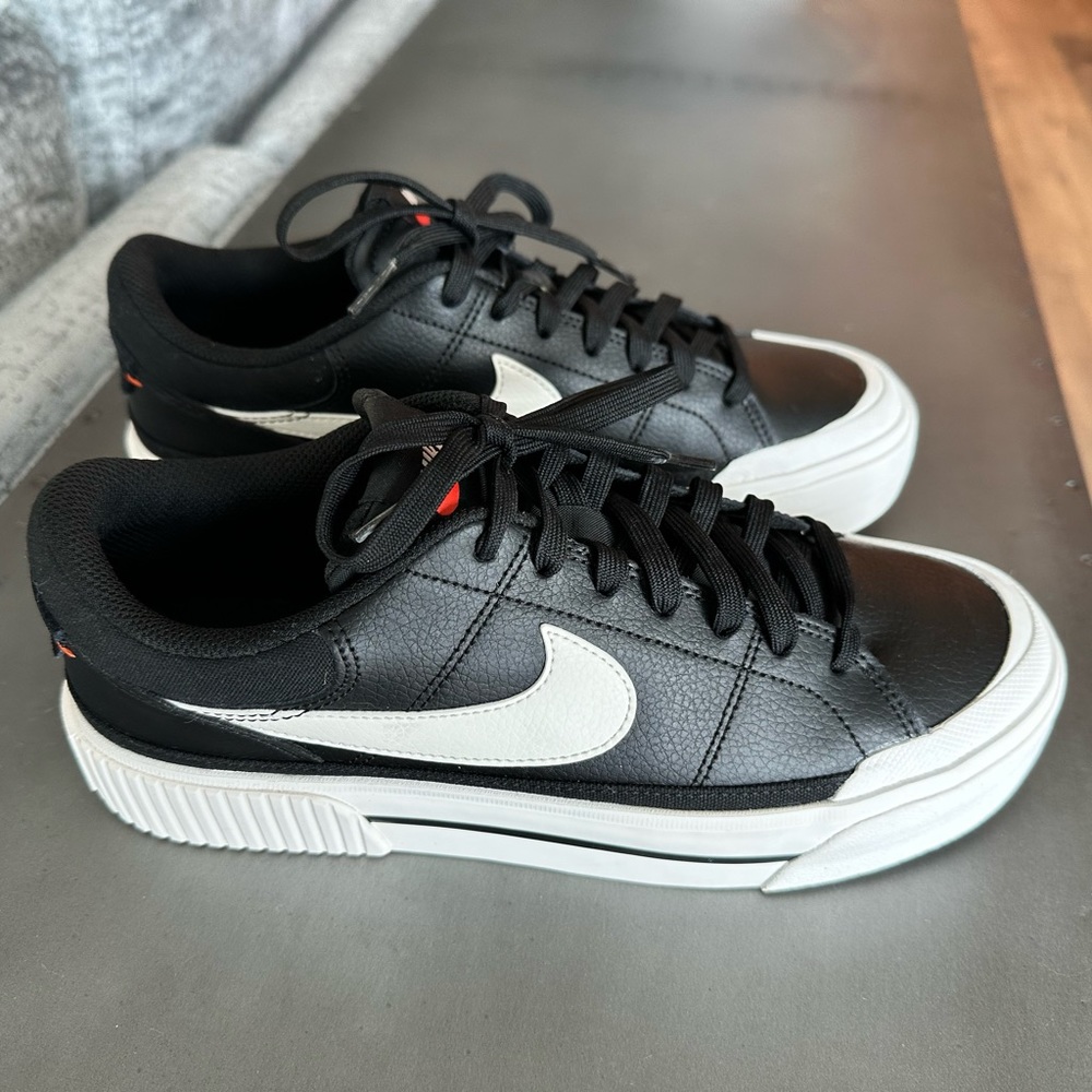 Nike Women's Black Leather Low-Top Sneakers with White Swoosh